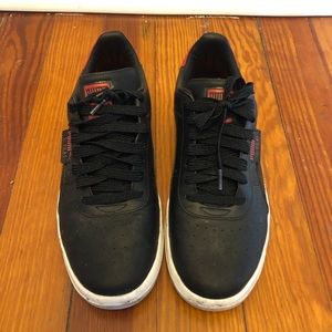 Black and red leather PUMA sneakers